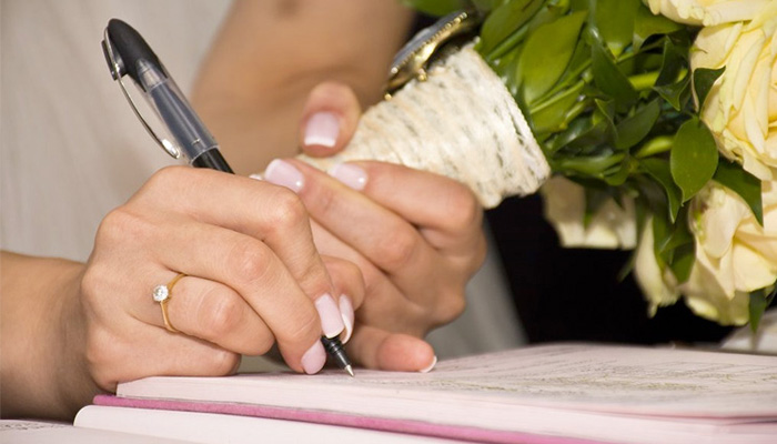 Signing the Register